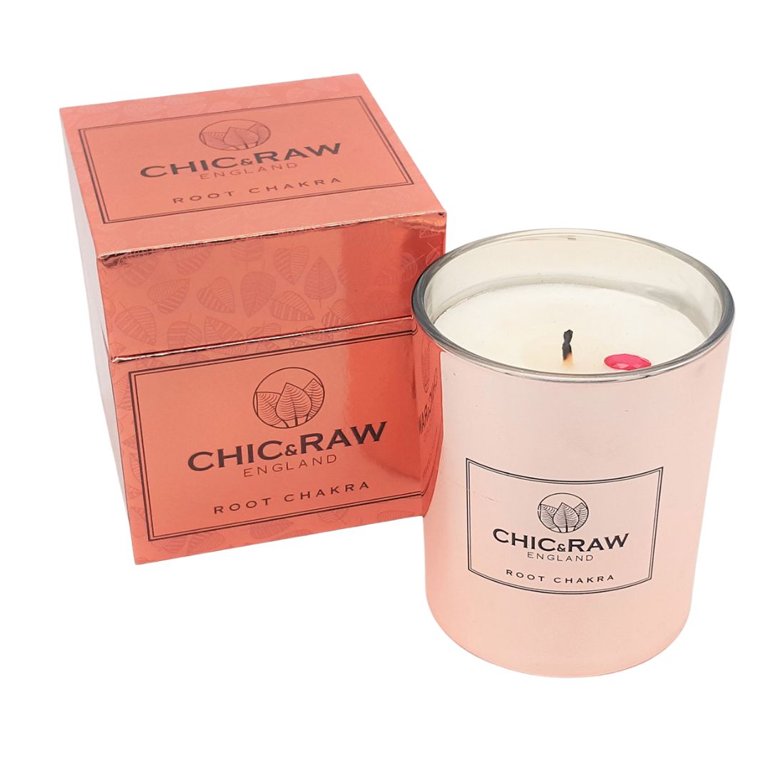 Close-up of ruby crystal root chakra candle, natural soy wax